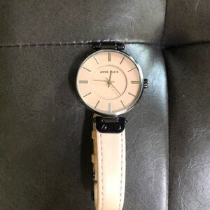 Anne Klein pink/tan and bronze watch. Never worn needs battery.